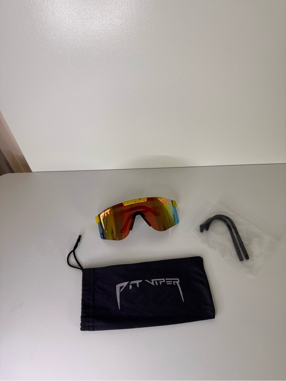 Pit Viper Green/Yellow/Orange Glasses with carrying case.